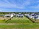 Aerial view of the neighborhood with large homes and well-manicured lawns at 4228 Sunset Preserve Blvd, Orlando, FL 32820