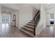 Staircase with wood and iron details at 4228 Sunset Preserve Blvd, Orlando, FL 32820