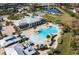 Amazing aerial view of the community pool, clubhouse and lush landscaping create a resort-like atmosphere at 4909 Drawdy Ct, St Cloud, FL 34772