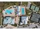 Fantastic aerial view showcases resort-style amenities including pools, tennis courts and beautiful landscaping at 4909 Drawdy Ct, St Cloud, FL 34772