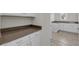 A well-organized laundry room with built-in cabinets and a sink for added convenience at 4909 Drawdy Ct, St Cloud, FL 34772