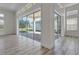 Bright living room featuring glass sliding doors providing access to the exterior patio at 4909 Drawdy Ct, St Cloud, FL 34772