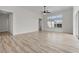 Bright living room with neutral color palette, tile floors, and a ceiling fan at 4909 Drawdy Ct, St Cloud, FL 34772