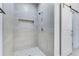 Modern tiled shower showcasing sleek design and a convenient built-in niche at 505 St Johns Ct, Kissimmee, FL 34759