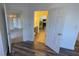 A doorway view of the bedroom showcasing the connection between the bathroom and living spaces at 5526 G Nw Ave # 4915, Orlando, FL 32815