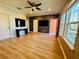 Open living space with modern floors and plenty of natural light at 561 Telfair Square Ct, Sanford, FL 32771