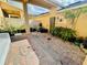 Cozy patio with brick flooring and lots of plants at 561 Telfair Square Ct, Sanford, FL 32771