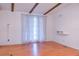 Bright living room featuring wood beams, and wood flooring at 630 Carpenter Rd, Orlando, FL 32833