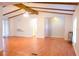 Spacious living room with vaulted ceiling and exposed beams, offering plenty of natural light at 630 Carpenter Rd, Orlando, FL 32833