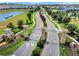 A scenic aerial shot of the ChampionsGate entrance, complete with landscaping and a glimpse of community amenities at 635 Ocean Course Ave # 635, Champions Gate, FL 33896