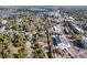 Scenic aerial view showcases property amidst tree-lined streets and neighborhood with easy access to nearby commercial areas at 640 Robinhood Dr # B, Maitland, FL 32751