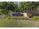 Attractive community entrance sign amid lush landscaping, showcasing the neighborhood's curb appeal at 8031 Enchantment Dr # Ge, Windermere, FL 34786