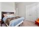 Bedroom featuring neutral walls, carpeted flooring, and comfortable decor at 8774 Bayview Crossing Dr, Winter Garden, FL 34787