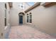 Charming front porch with brick pavers and traditional door and sidelight windows at 8774 Bayview Crossing Dr, Winter Garden, FL 34787