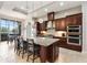 Gorgeous eat-in kitchen featuring an island and stainless appliances at 8774 Bayview Crossing Dr, Winter Garden, FL 34787