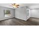 Bright bedroom with a ceiling fan, and wood-look flooring at 912 Enterprise Ave, New Smyrna Beach, FL 32168