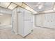 A full kitchen view featuring a ceiling fan, lots of cabinet space, and a refrigerator at 95 Carolwood Blvd, Fern Park, FL 32730