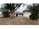 Charming single-story home with a well-manicured lawn and a welcoming front porch at 1201 S Oxalis Ave, Orlando, FL 32807