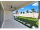 Spacious backyard featuring manicured lawn, stepping stones, and a privacy fence, creating a serene outdoor space at 1204 Pando Loop, Orlando, FL 32824