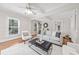 Cozy living room featuring hardwood floors, neutral color palette, and bright natural light at 122 N Hyer Ave, Orlando, FL 32801