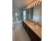 A standard bathroom with double sinks and shower/tub combo at 1710 San Jacinto Cir # 1710, Sanford, FL 32771