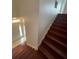 View of the wooden staircase leading to the front entrance at 1710 San Jacinto Cir # 1710, Sanford, FL 32771