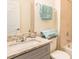 Stylish bathroom with granite countertops, modern fixtures, and a pristine bathtub/shower combo at 1772 Coriander Dr, Kissimmee, FL 34759
