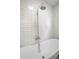 Stylish bathroom with a vintage clawfoot tub and white subway tiles at 202 Division, Deland, FL 32720