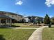 Community playground featuring play structures, a gazebo, and picnic tables in a green space at 2523 Econ Landing Blvd, Orlando, FL 32825