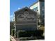 Econ Landing community entrance sign framed by lush green landscaping at 2523 Econ Landing Blvd, Orlando, FL 32825