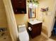 The bathroom features a shower/tub combination, cream tile, and vanity at 282 Scottsdale Sq # 282, Winter Park, FL 32792