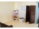 Bright, cheerful room with tan walls and tile floors, and neutral brown accents at 282 Scottsdale Sq # 282, Winter Park, FL 32792