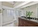 Bright bathroom featuring a double sink vanity, a standing shower and window for natural light at 302 Bridie Ct, Winter Springs, FL 32708