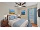 Cozy bedroom featuring classic furniture, coordinated blue accents, and ample natural light at 302 Bridie Ct, Winter Springs, FL 32708