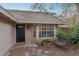 Charming front door with a quaint seating area and a bay window at 302 Bridie Ct, Winter Springs, FL 32708