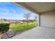 An outdoor patio with serene lake views and lush greenery at 360 Arbor Lakes Dr, Davenport, FL 33896