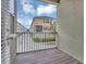 Balcony overlooking the neighborhood, providing a peaceful outdoor space at 486 Windmill Palm Cir, Altamonte Springs, FL 32701