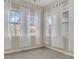 Bright dining room featuring elegant chandelier and natural light at 486 Windmill Palm Cir, Altamonte Springs, FL 32701