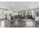 Open-concept living space with a modern kitchen island, dining area, and comfortable living room at 4860 Osprey Way, Winter Haven, FL 33881