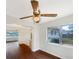 Dining area featuring a decorative ceiling fan and bright window views at 5404 Milan Dr, Orlando, FL 32810