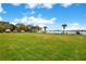 Well-maintained lawn with boat parking along the lakefront in this residential community at 5405 Hansel Ave # G9, Orlando, FL 32809