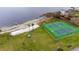 Aerial view of two well-maintained tennis courts near the beach at 5405 Hansel Ave # G9, Orlando, FL 32809