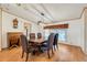 Dining room with hardwood floors, modern lighting, and classic furnishings at 6302 Bayberry Ne Blvd, Winter Haven, FL 33881