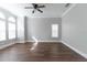 Inviting bedroom with hardwood floors and plenty of natural light at 6825 Dolce St, Orlando, FL 32819