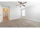 Bedroom features carpet, ceiling fan, and blinds on window at 6825 Dolce St, Orlando, FL 32819