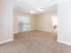 Bonus room offering ample space and natural light from a large window at 6825 Dolce St, Orlando, FL 32819