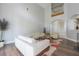 Bright living room featuring hardwood floors, high ceilings, and lots of natural light at 6825 Dolce St, Orlando, FL 32819