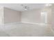 Bright living area with recessed lights, marble-look tile floors, and neutral wall paint at 855 S Hancock Dr, Deltona, FL 32725