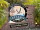 Welcoming brick sign for the Sleepy Hollow Complex in Leesburg, Florida at 9157 Harris Hawk Dr, Leesburg, FL 34788