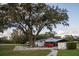 Spacious yard with a large shed and plenty of room to roam at 9919 Hickory Hollow Rd, Leesburg, FL 34788